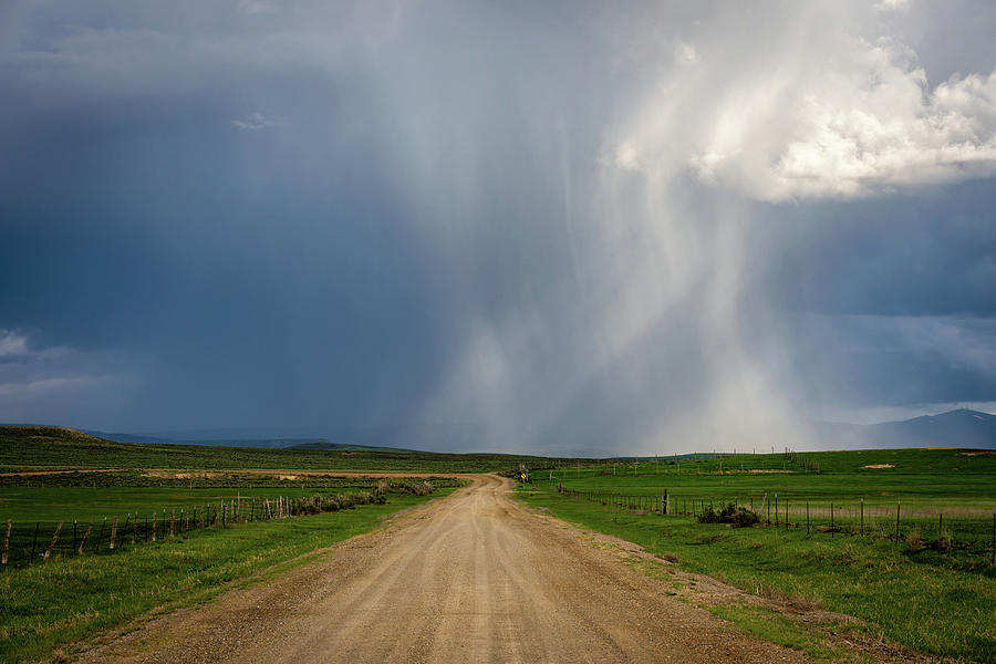 Dirt Road Leading to a Storm Photograph by Wesley Aston