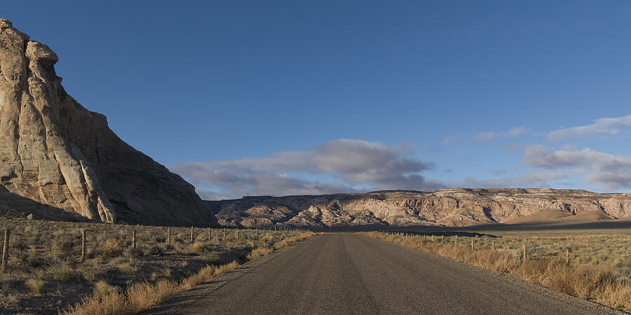 Dirt road passing through a landscape Photograph by Fotosearch