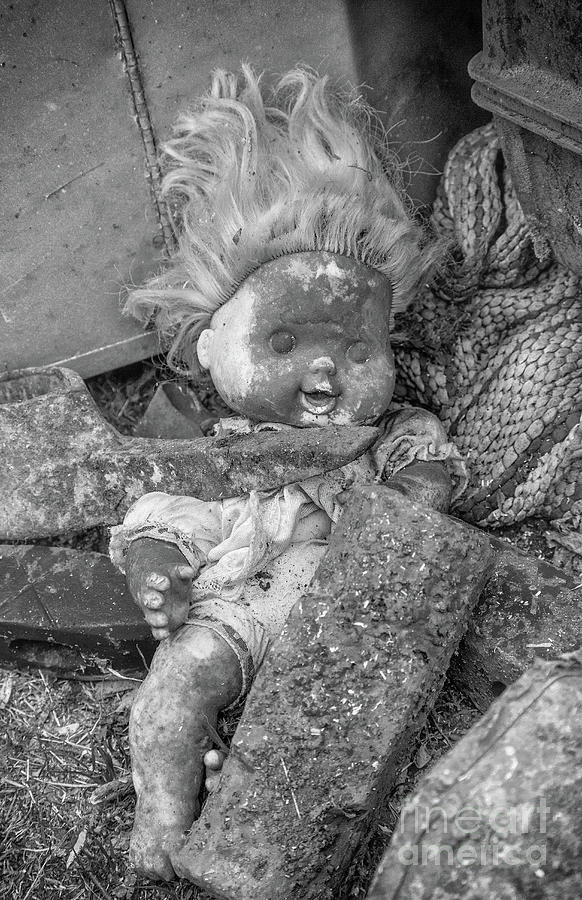 Discarded Toy Doll Black And White Photograph
