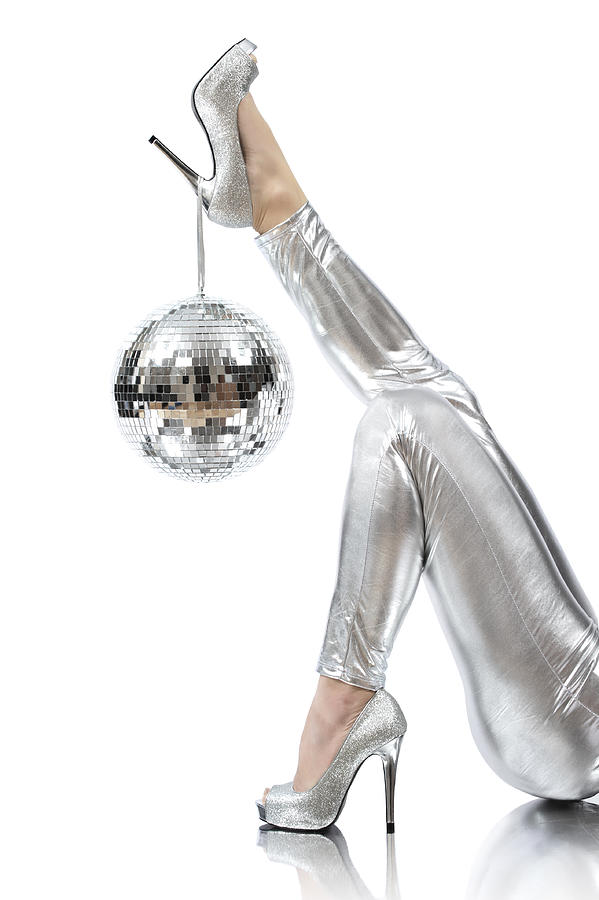 Disco time photo of disco ball hanging on silver high heels Photograph by Natalie-claude