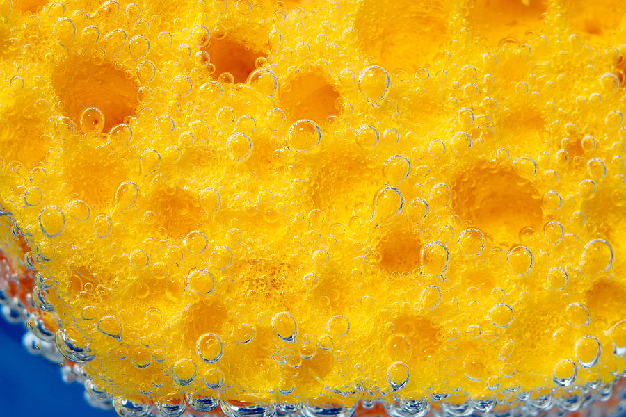 dishwashing sponge texture background. Surface of yellow sponge for washing dishes. close-up underwater Photograph by Алексей Филатов