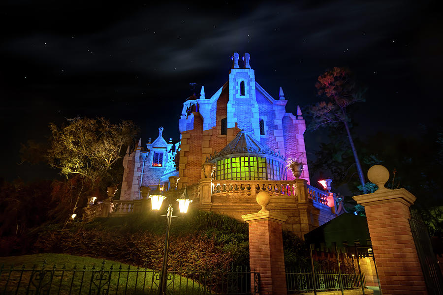 Disneys Haunted Mansion at Night Photograph by Mark Andrew Thomas