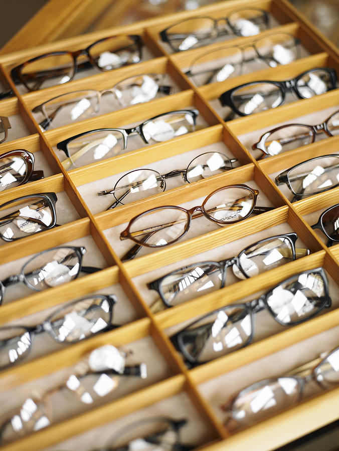Display case of eyeglasses, close-up, high angle view Photograph by Siri Stafford