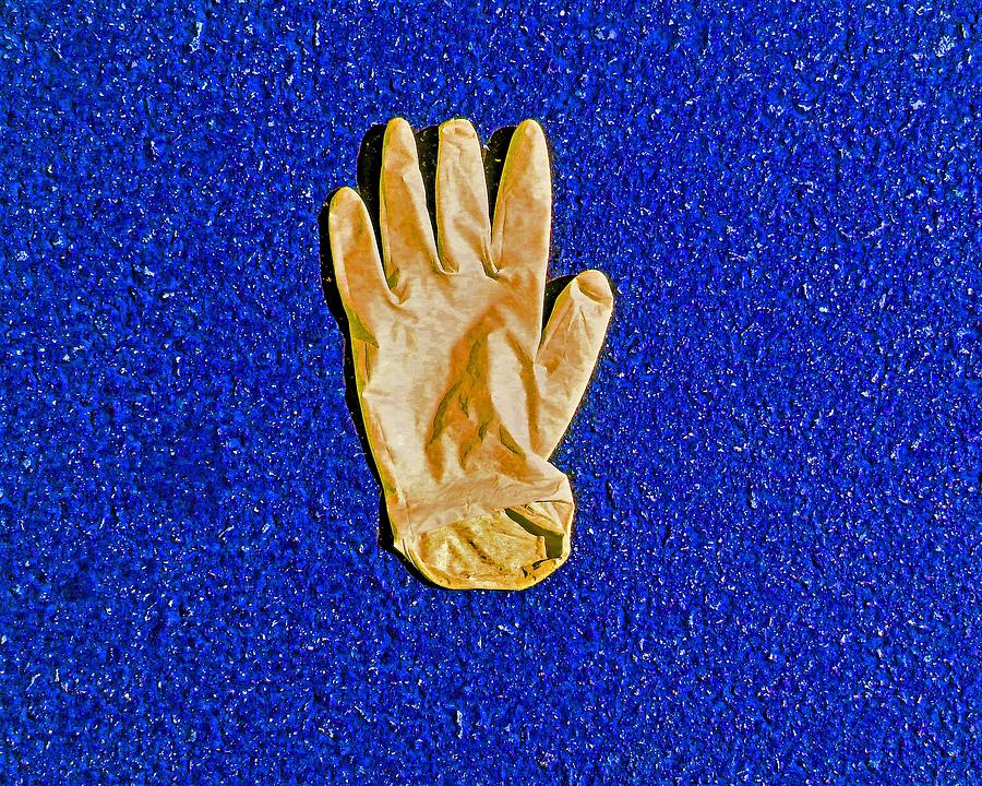 Disposable Glove In Space Photograph by Andrew Lawrence