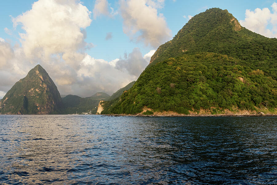 Distant Petit Piton and Gros Piton are located on the tropical island
