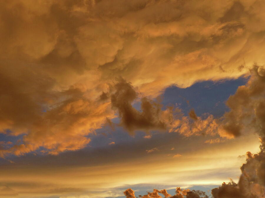 Disturbing Sunset Clouds Photograph by Lyuba Filatova