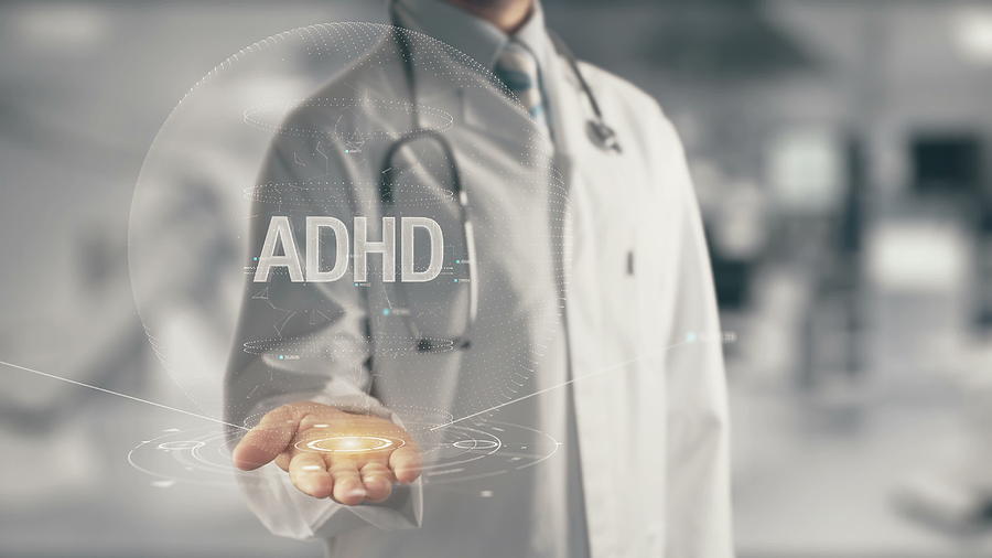 Doctor holding in hand ADHD Photograph by Ankabala