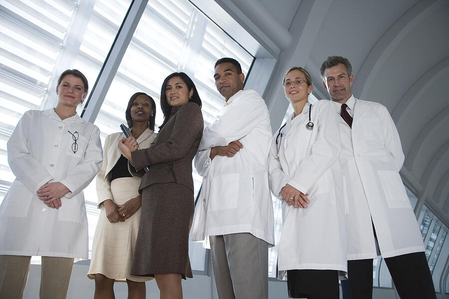 Doctors and businesswomen Photograph by Comstock Images