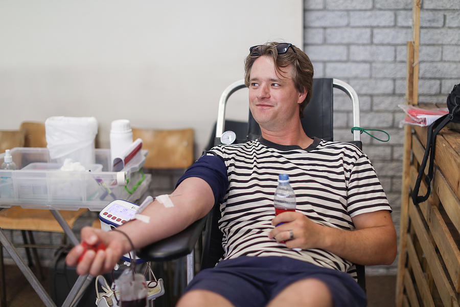 Donating Blood. Photograph by Petri Oeschger