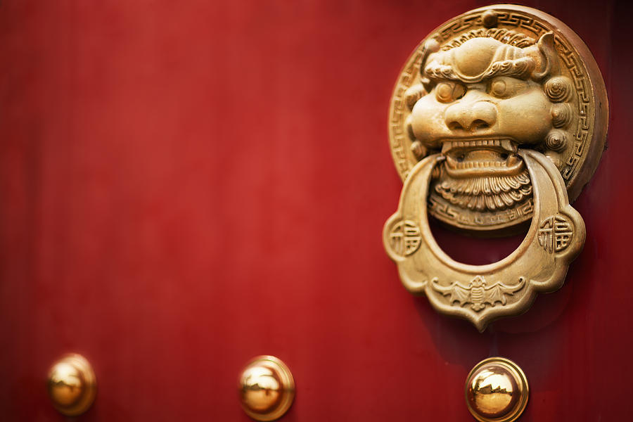 Door handle on Red Temple Door Photograph by Shannon Fagan