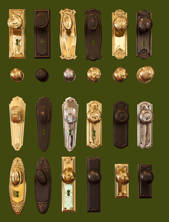 Door handles display collection isolated on dark green background Photograph by Imamember
