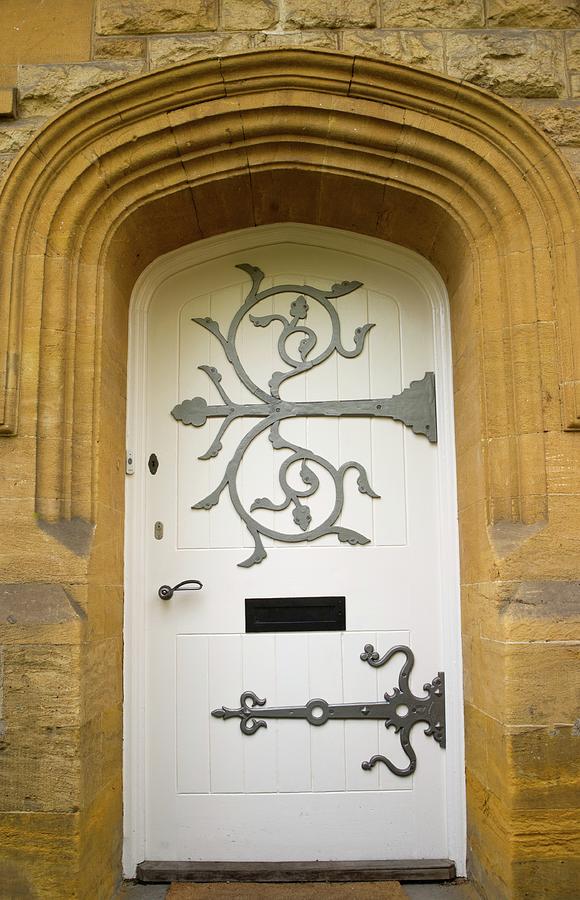 Door with a Flourishing Hinges Photograph by Douglas Barnett