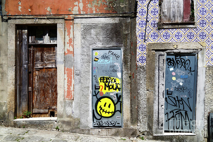 Doors and graffiti Porto Portugal Photograph by James Brunker