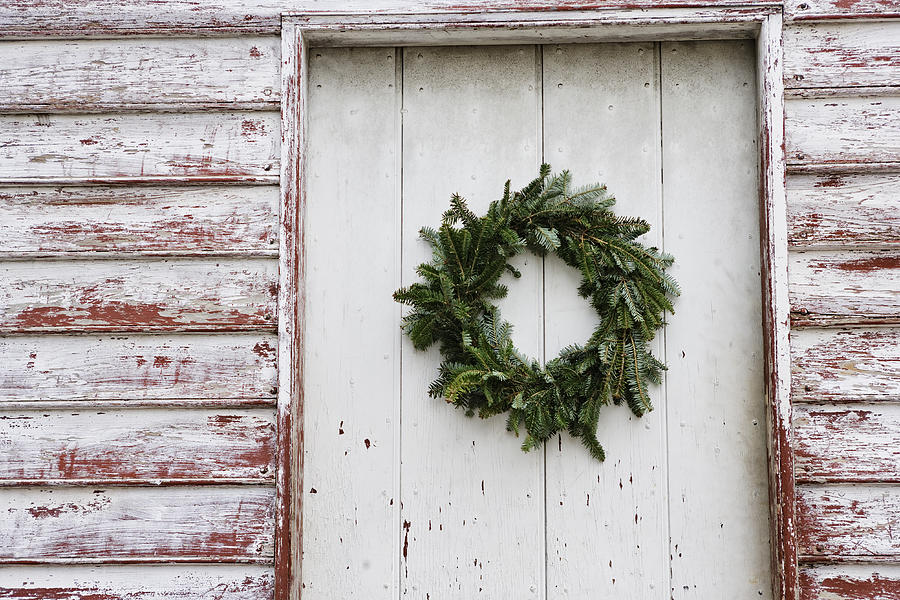 Doorway with Christmas wreath Photograph by Wbritten