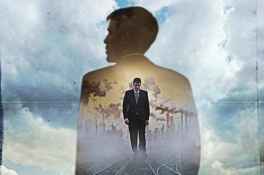 Double exposure of businessman in clouds Photograph by Pete Saloutos
