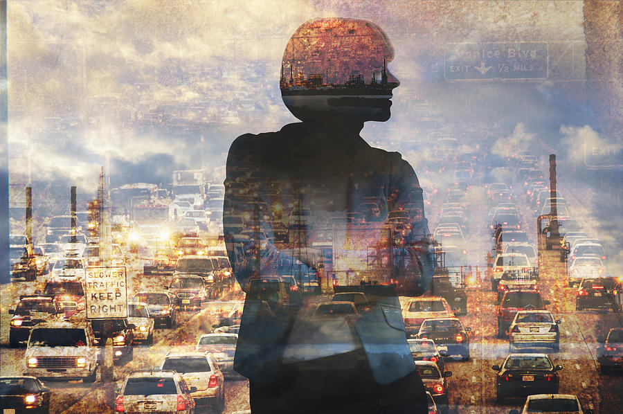 Double exposure of businesswoman and traffic Photograph by Pete Saloutos