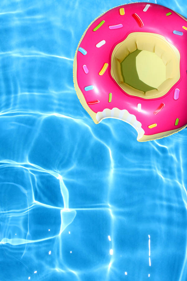 Doughnut Swimming Pool Inflatable Photograph by Kelly Bowden