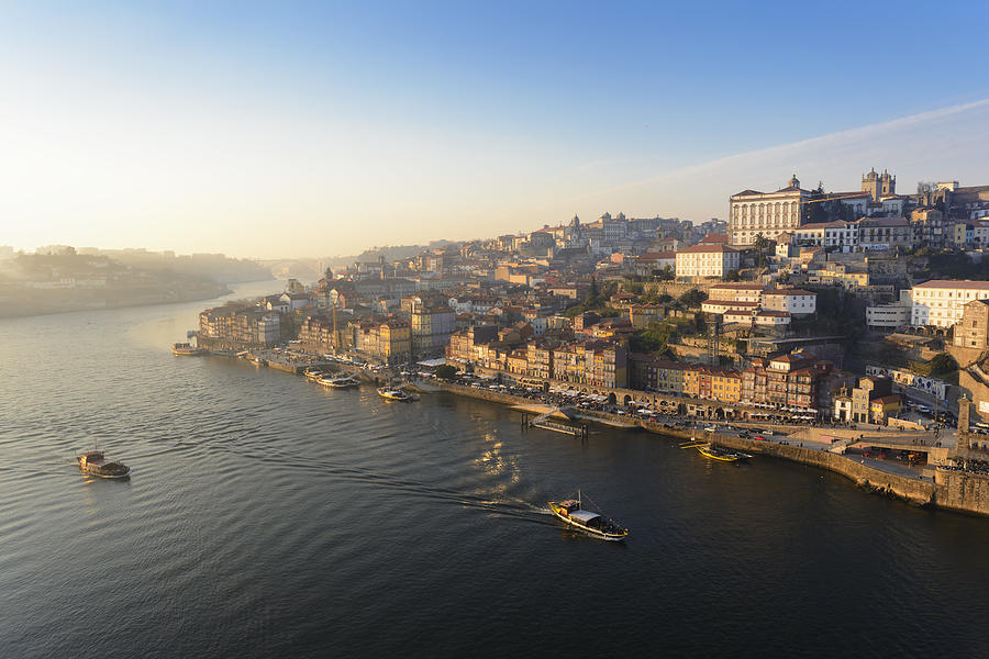 Douro river and Porto old town at sunset, Portugal Photograph by Wayfarerlife Photography