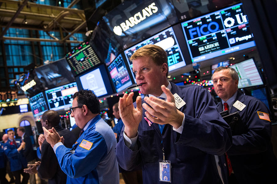 Dow Rises Over 400 Points Day After Fed Signals No Rise In Interest Rates Photograph by Andrew Burton Dow Rises Over 400 Points Day After Fed Signals No Rise In Interest Rates Photograph by Andrew Burton