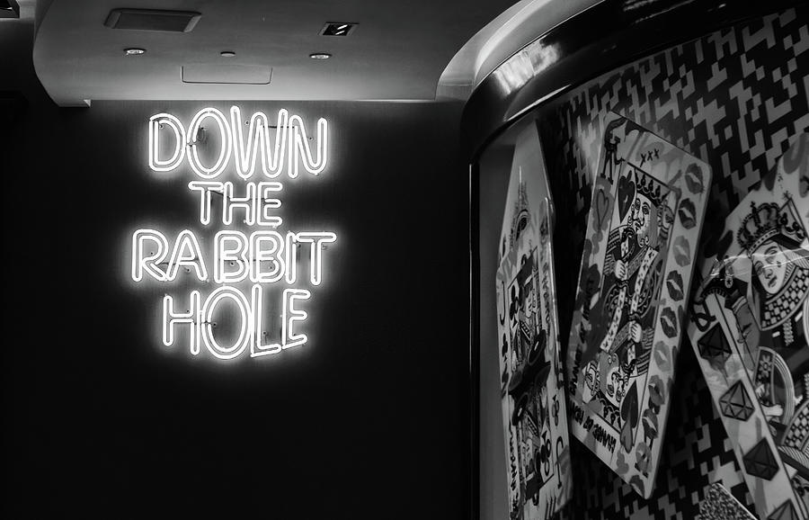 Down the Rabbit Hole Neon and Wonderland Poker Cards Pop Art Las Vegas Black and White Photograph by Shawn OBrien