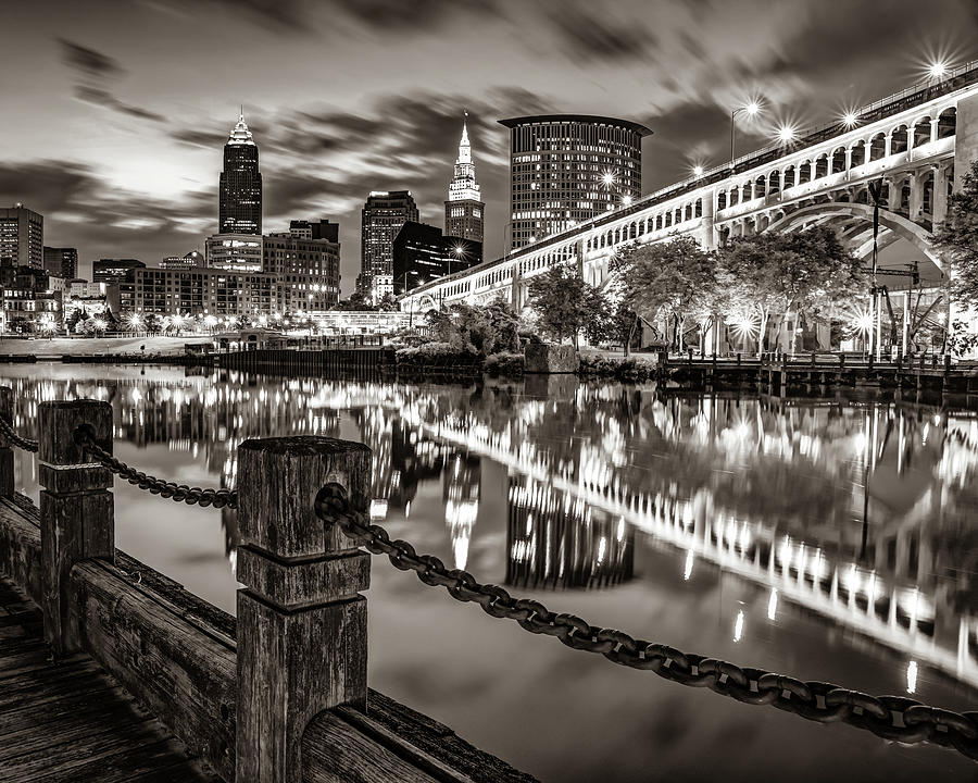 Downtown Cleveland Ohio Skyline in Sepia Over The Cuyahoga River Photograph by Gregory Ballos