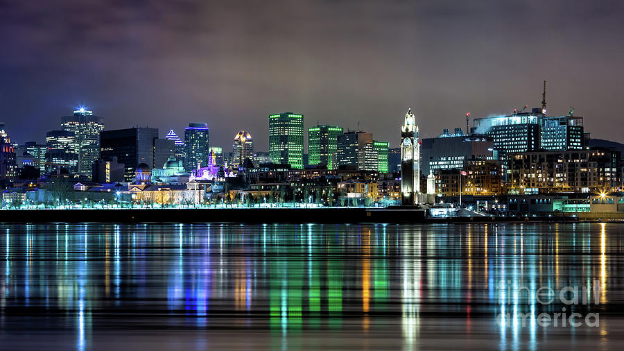 Downtown Montreal in winter. Night shot with reflected city ligh Photograph by Jane Rix