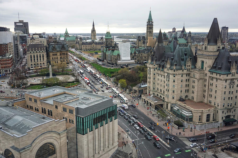 downtown Ottawa in the spring viewed from high up. Aerial view of Chateau Laurier and Canadian Parliament. Traffic on Wellington Photograph by Jana Kriz