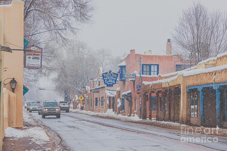 Downtown Taos while snowing  Photograph by Elijah Rael