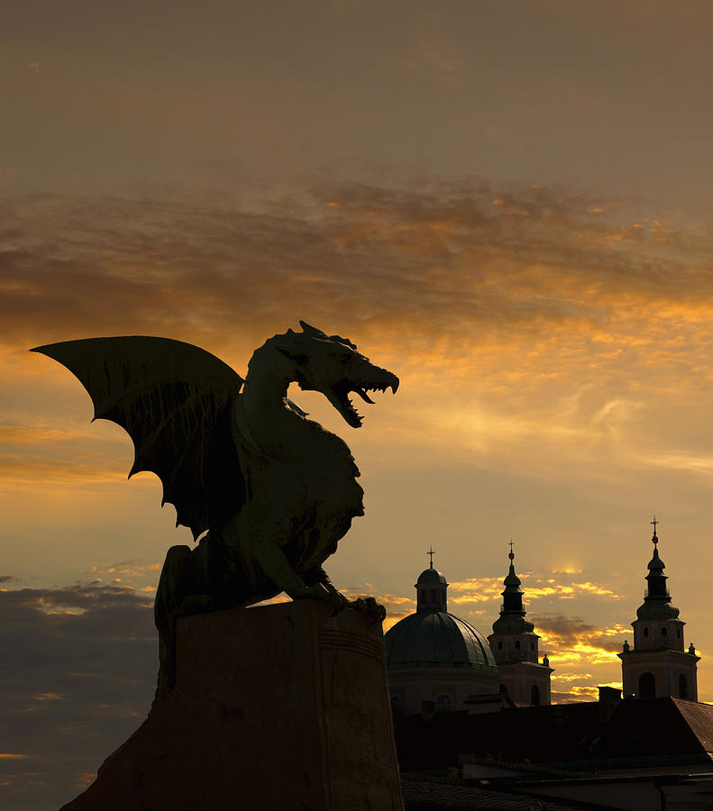 Dragon statue on Dragon Bridge over Ljublja Photograph by Buena Vista Images