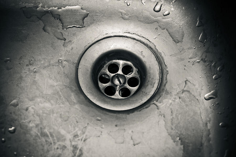 Drain hole in a dirty sink close up Photograph by Devin_Pavel