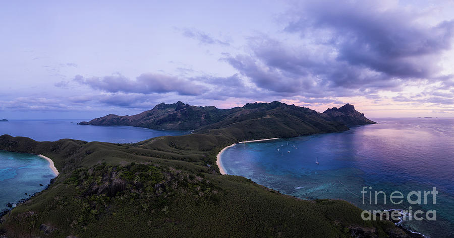 Dramatic aerial panorama of the sunset over the Waya island in t Photograph by Didier Marti