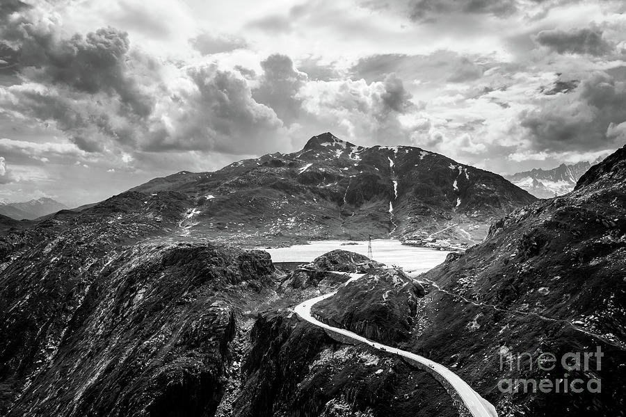 Dramatic black and white view of the Grimsel pass in the alps in Photograph by Didier Marti