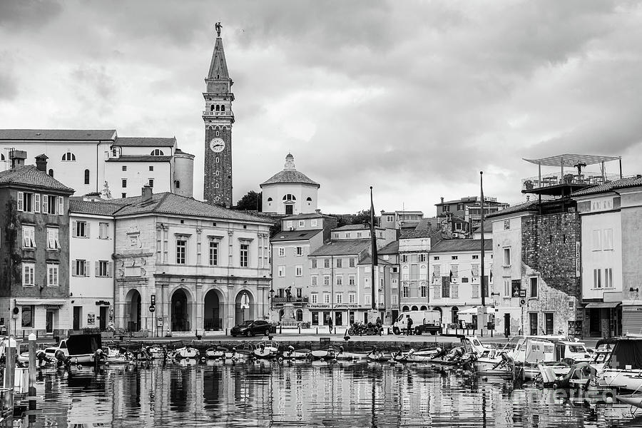 Dramatic black and white view of the Piran old town and marina i Photograph by Didier Marti