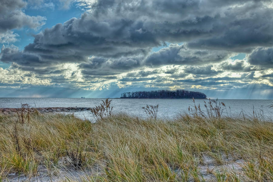 Sand Photograph - Dramatic Clouds Over Charles Island by John Supan