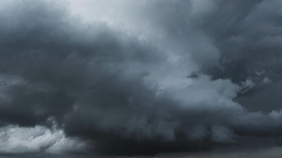 Dramatic dark storm clouds Photograph by Mikhail Kokhanchikov