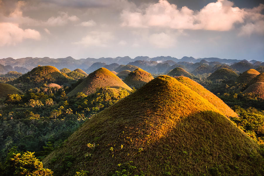 Dramatic light over Chocolate hills, Bohol, Philippines Photograph by Matteo Colombo