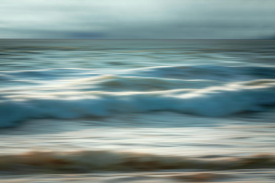 Dramatic seascape abstract. Sea waves in motion blur, and cloudy Photograph by Hanna Tor
