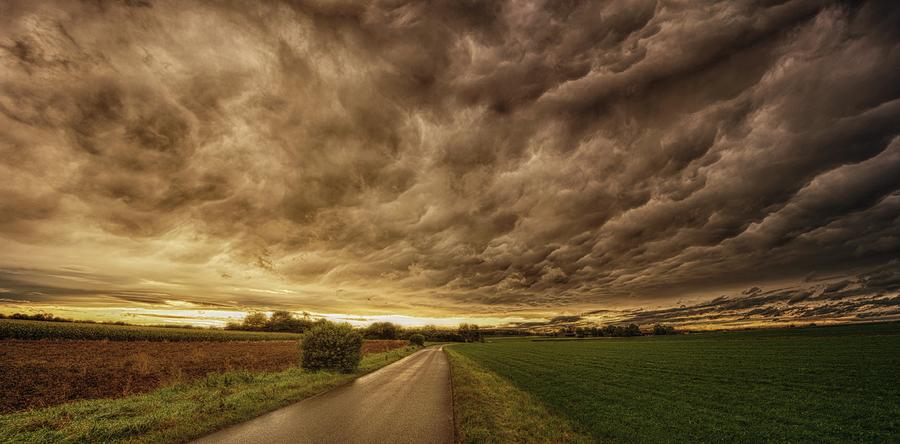 Dramatic sky landscape Photograph by Lilia S