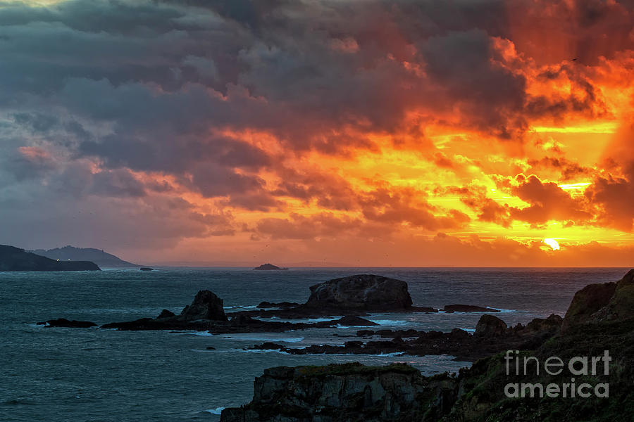 Dramatic Sky of Fire over Miranda Islands at the Mouth of Ares Estuary La Coruna Galicia Photograph by Pablo Avanzini
