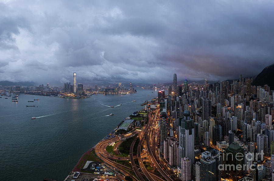 Dramatic sky over Hong Kong island Central distict and the Victo Photograph by Didier Marti