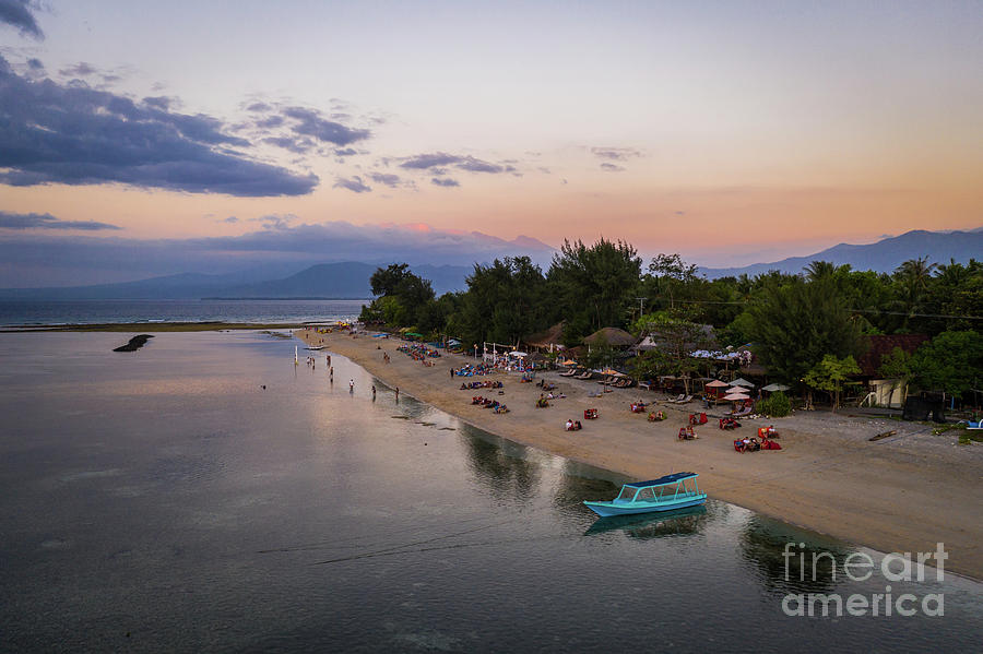 Dramatic sunset over the beach of Gili Air in Lombok, Indonesia. Photograph by Didier Marti