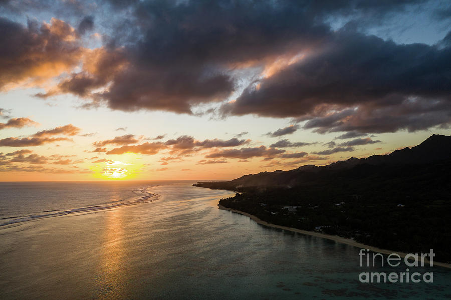 Dramatic sunset over the Rarotonga island, part of the Cooks isl Photograph by Didier Marti
