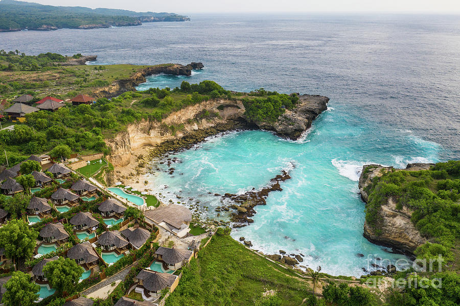 Dramatic view of the stunning blue lagoon by cliffs in Nusa Ceni Photograph by Didier Marti