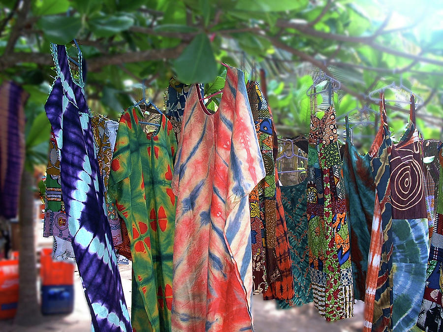 Dresses on a Tree in Ghana Photograph by Wayne King