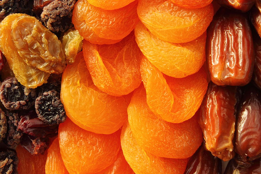 Dried fruit assortment of dates, raisins and apricots Photograph by Pejft