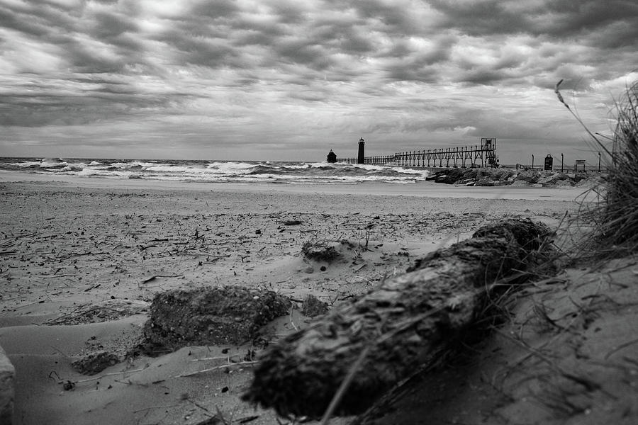 Driftwood at Grand Haven Pier in Black and White Photograph by Eldon McGraw