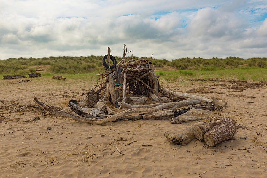 Driftwood beach hut Photograph by Gary Eason