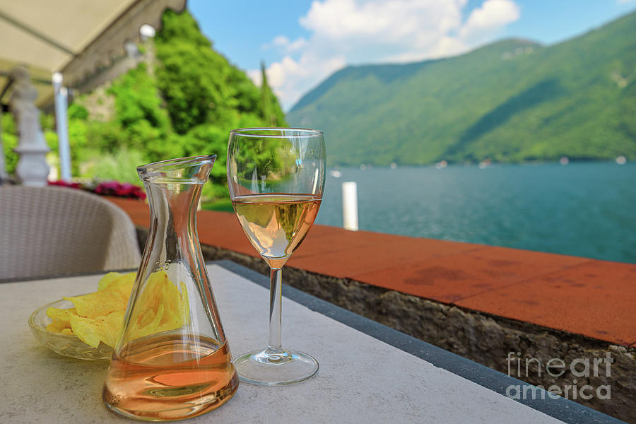 drinking rose wine in Lugano lakefront Photograph by Benny Marty