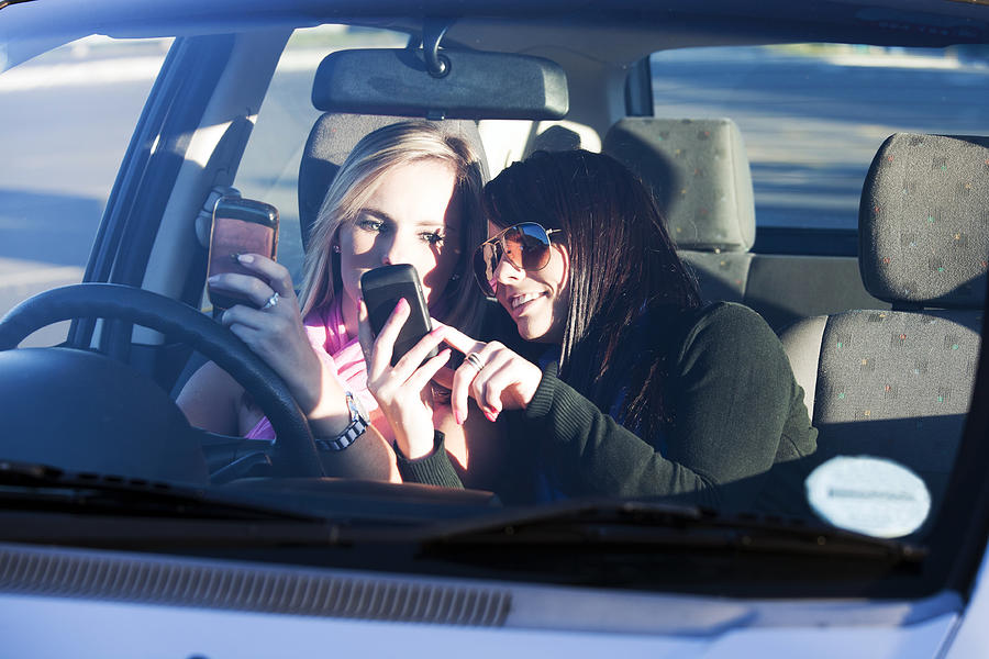 Driving and texting Photograph by Heidijpix