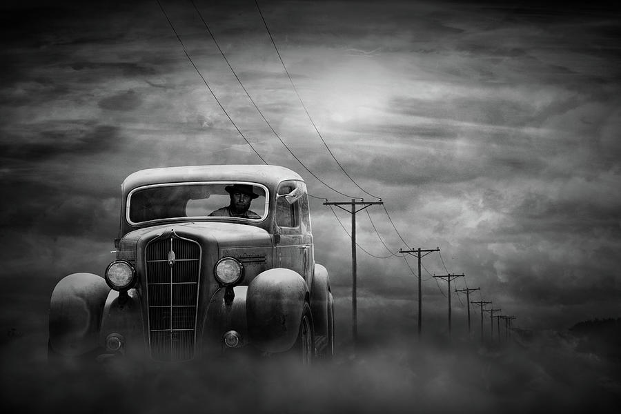 Driving Down A Dark Dusty Road in Black and White Photograph by Randall Nyhof